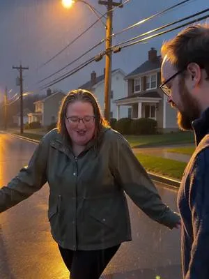 @💜Kelsey💜  @cobber.adam  dancing outside during a rainstorm laughing a